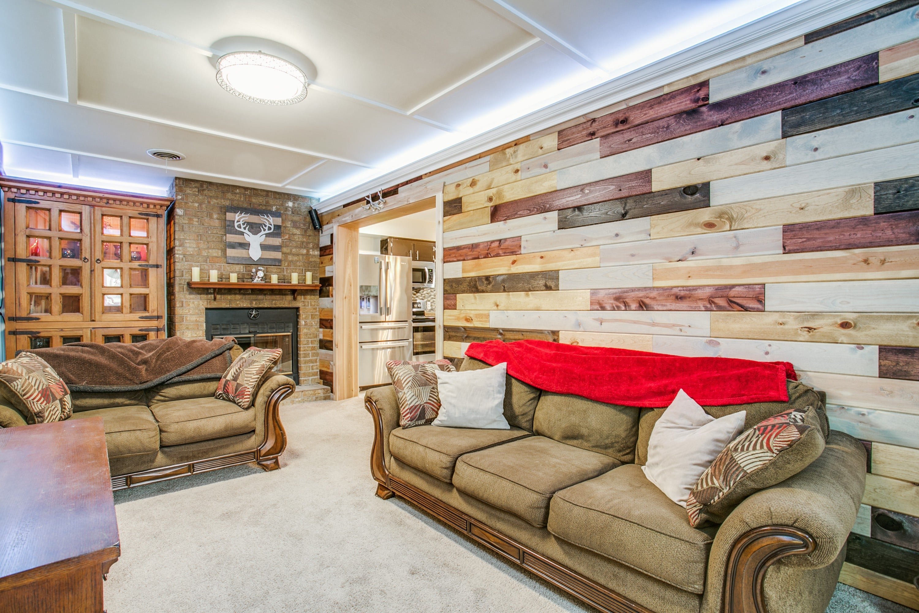 Following a complete remodel by NorTex Specialized Maintenance, the house how has trendy wood paneling and new electric wiring. 